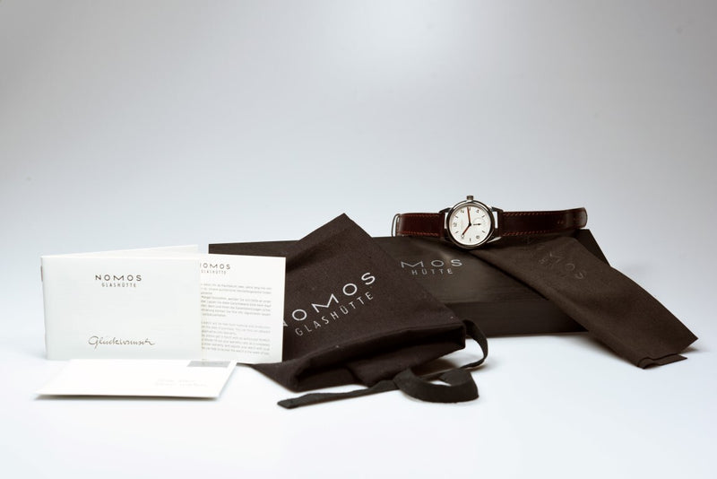Nomos pre top owned
